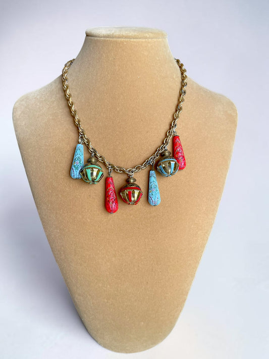 Art Nouveau Egyptian Painted Glyph Molded Art Glass & Bell Charm Necklace