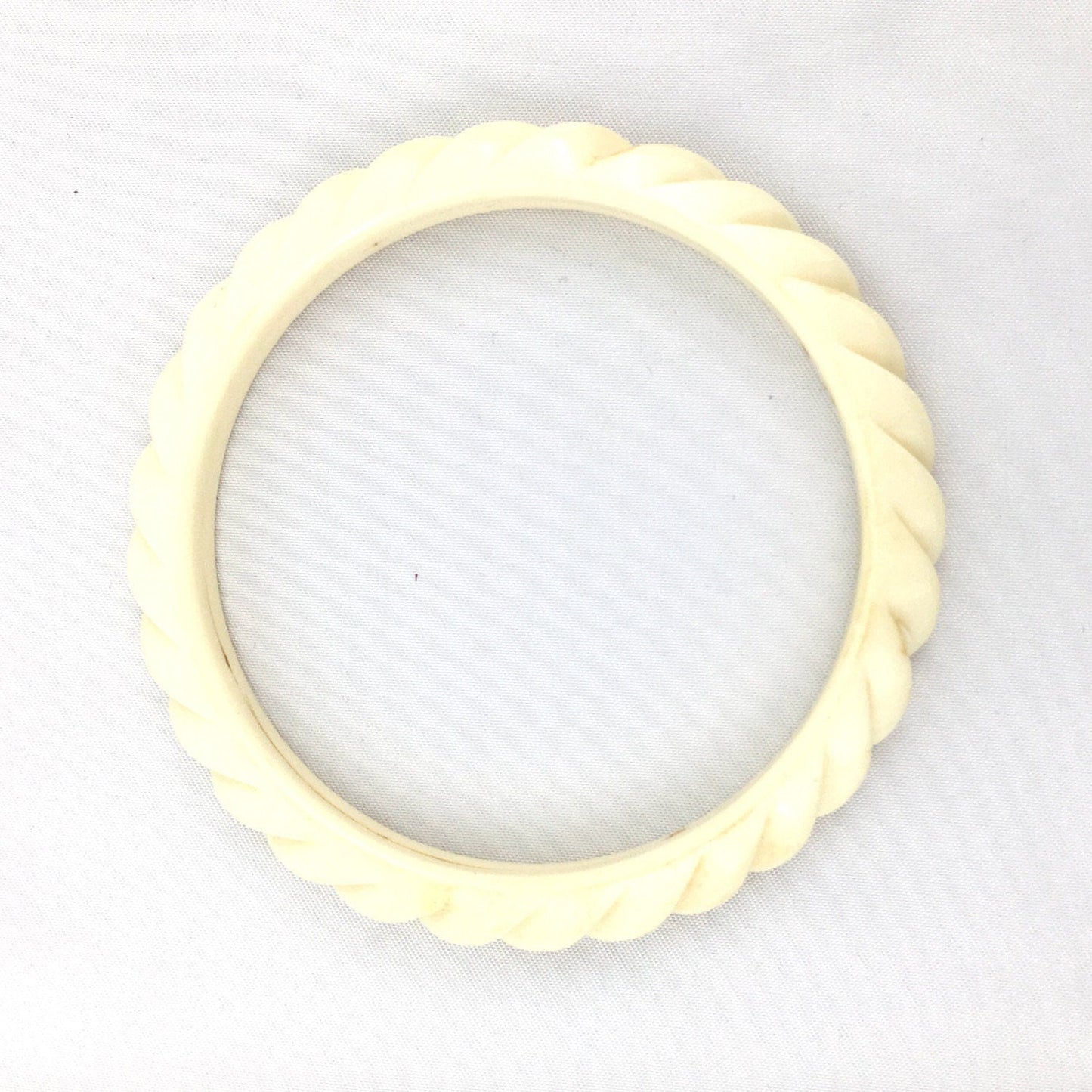 Vintage bone & butterscotch plastic bangle set