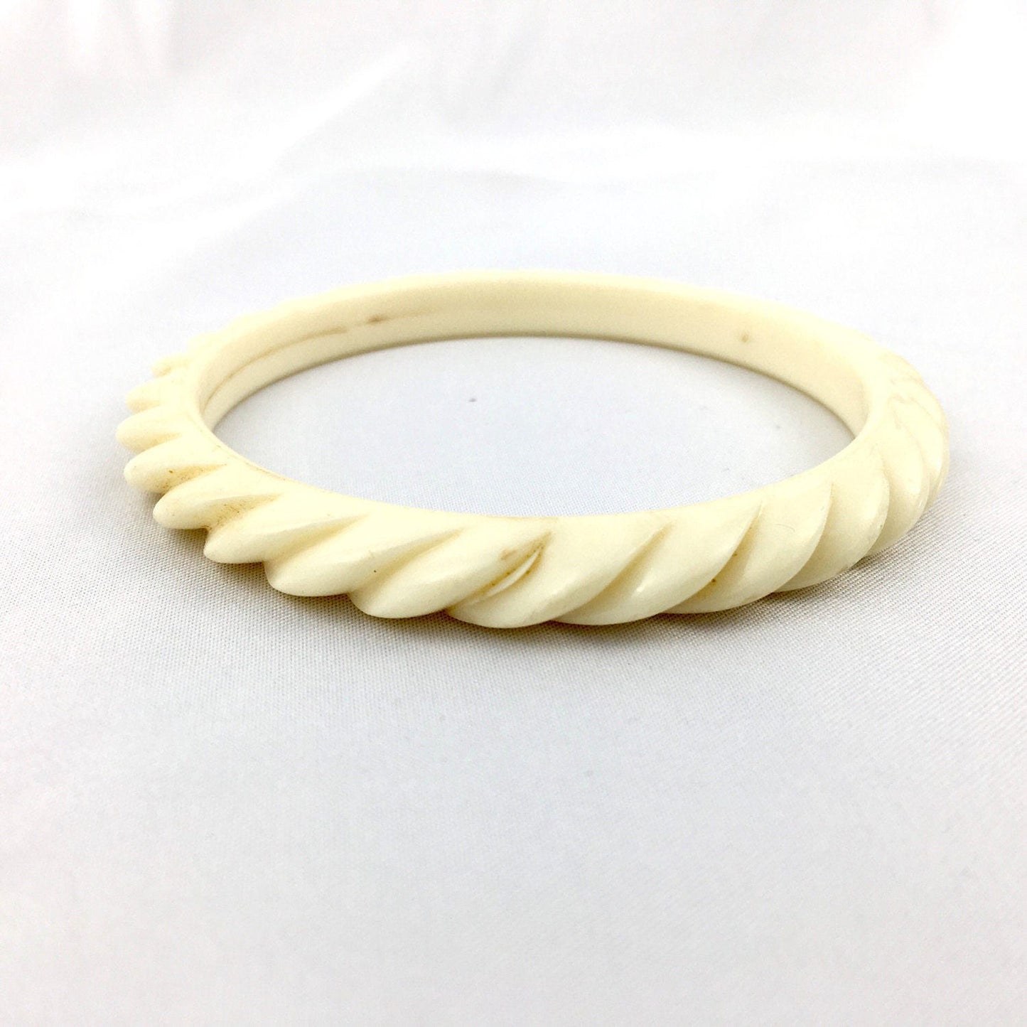 Vintage bone & butterscotch plastic bangle set