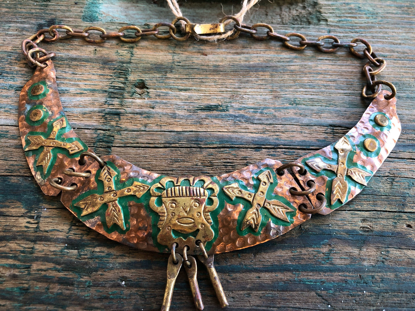 Mexican tribal hand hammered copper and brace tribal mask and arrow choker necklace