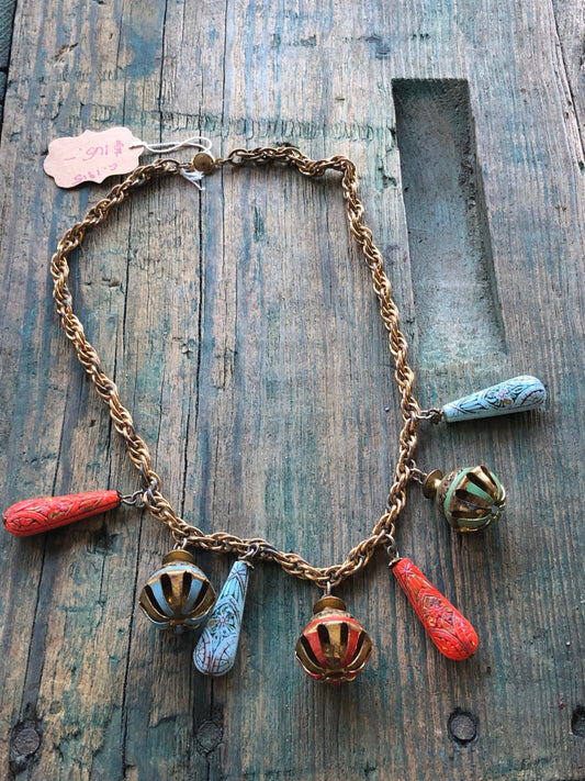 Art Nouveau Egyptian Painted Glyph Molded Art Glass & Bell Charm Necklace