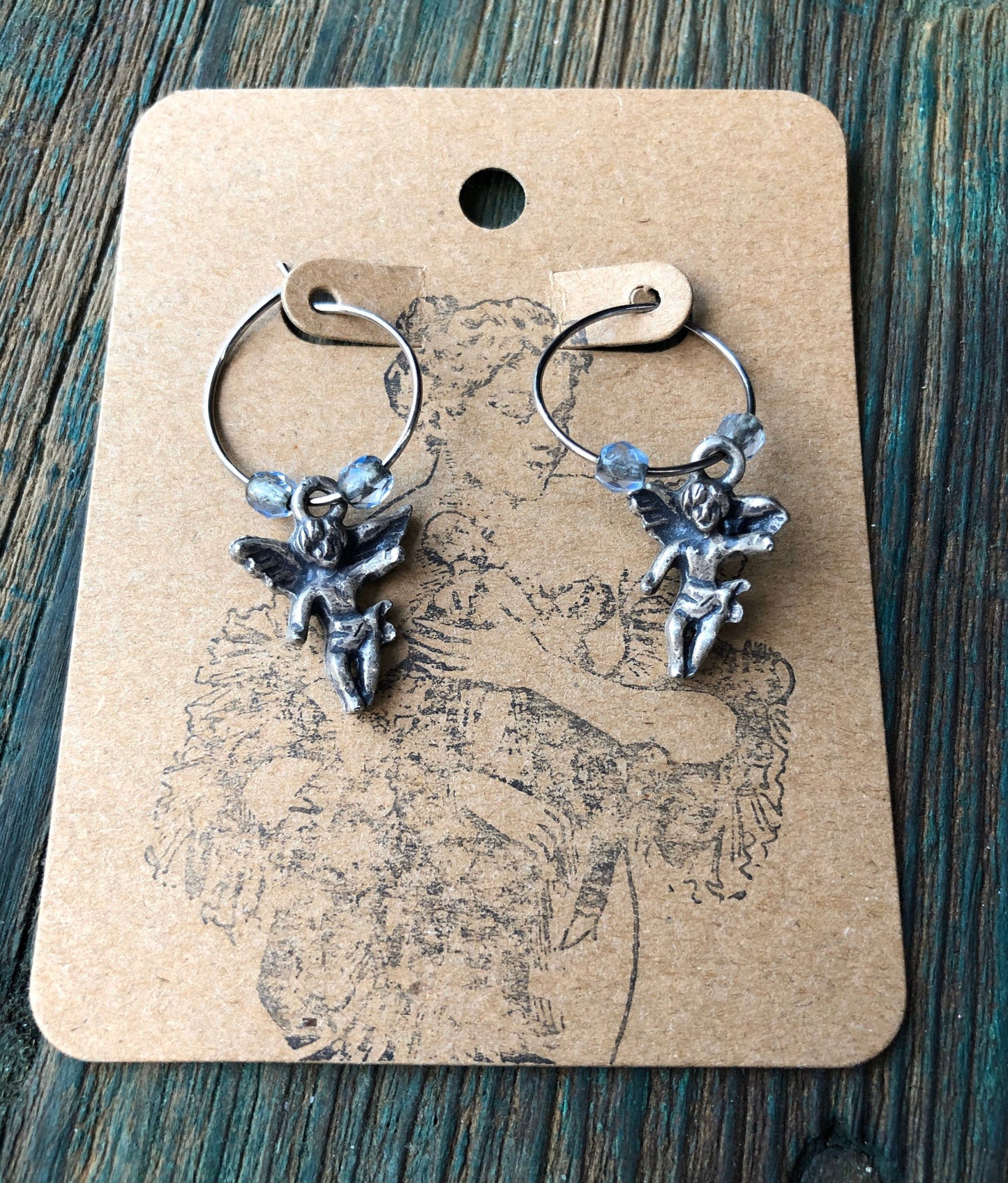 Sterling silver & blue topaz cherub angel hoop earrings