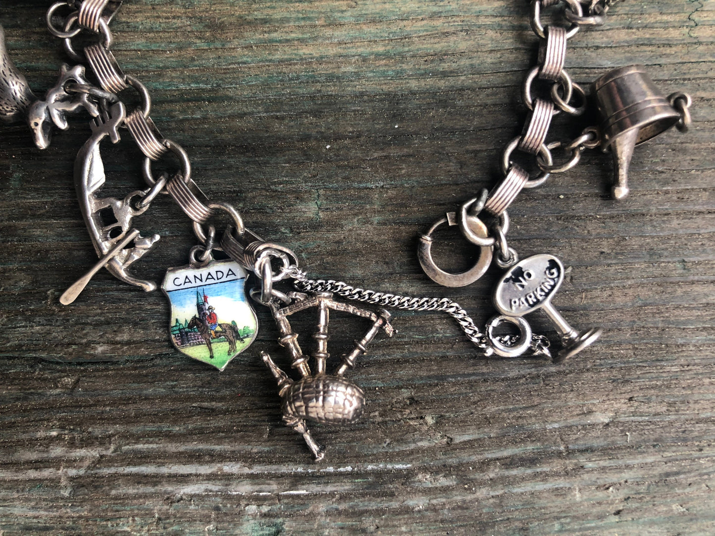 Vintage Sterling Silver Charm Bracelet with Windmill, Reindeer, Eiffel Tower, Bagpipes, Dutch Enamel Shoe, Champagne, Cabin & More