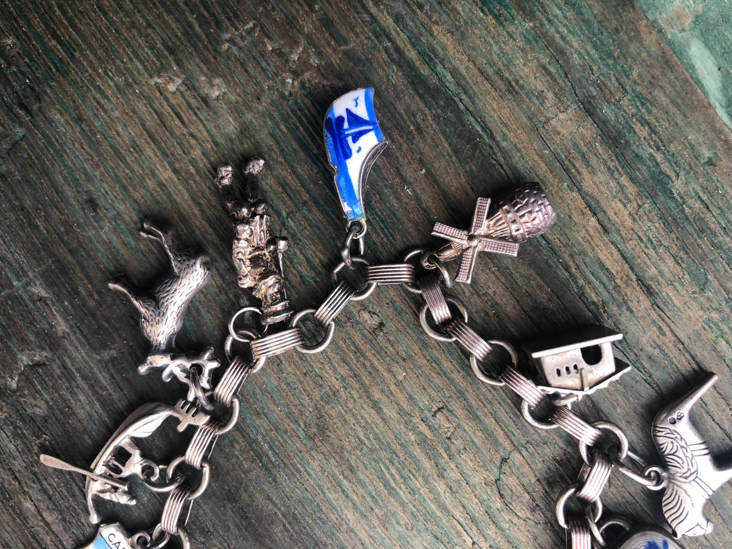 Vintage Sterling Silver Charm Bracelet with Windmill, Reindeer, Eiffel Tower, Bagpipes, Dutch Enamel Shoe, Champagne, Cabin & More
