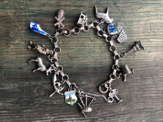 Vintage Sterling Silver Charm Bracelet with Windmill, Reindeer, Eiffel Tower, Bagpipes, Dutch Enamel Shoe, Champagne, Cabin & More
