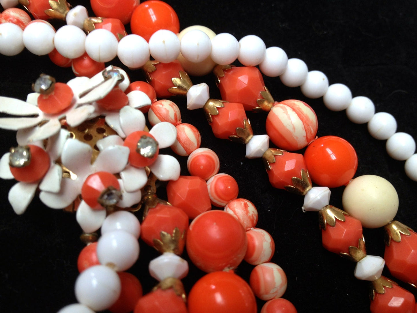 Vintage Orange & Cream Faceted and Marbled Early Plastic and Brass Beaded Multi Strand Bib Necklace with Enamel Crystal Flower Clasp