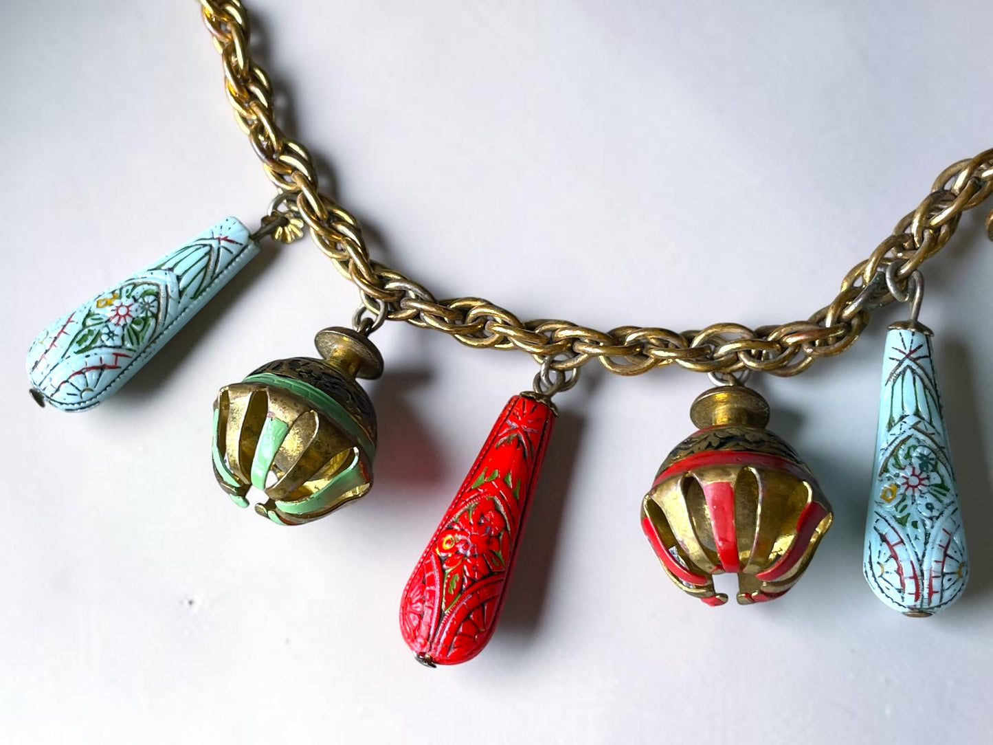 Art Nouveau Egyptian Painted Glyph Molded Art Glass & Bell Charm Necklace