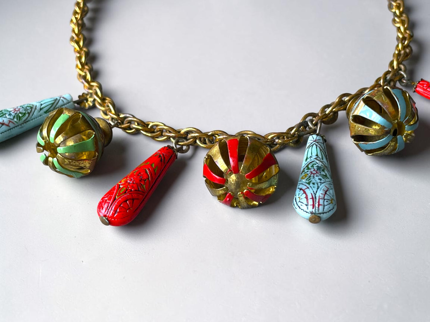 Art Nouveau Egyptian Painted Glyph Molded Art Glass & Bell Charm Necklace