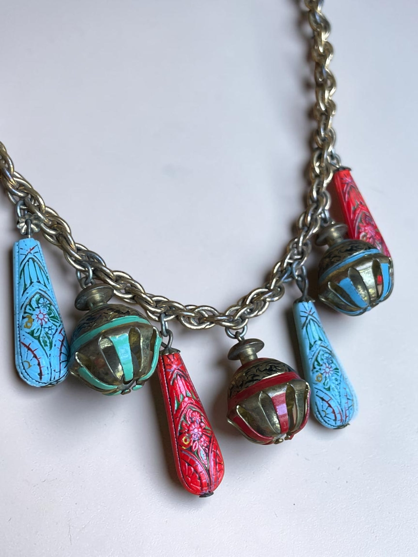 Art Nouveau Egyptian Painted Glyph Molded Art Glass & Bell Charm Necklace