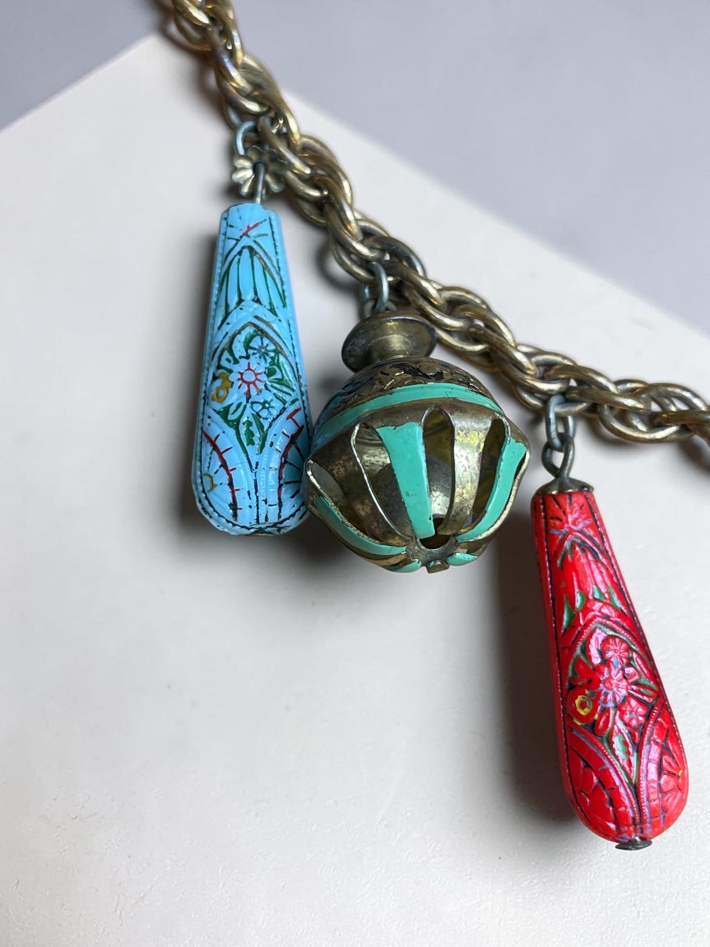 Art Nouveau Egyptian Painted Glyph Molded Art Glass & Bell Charm Necklace