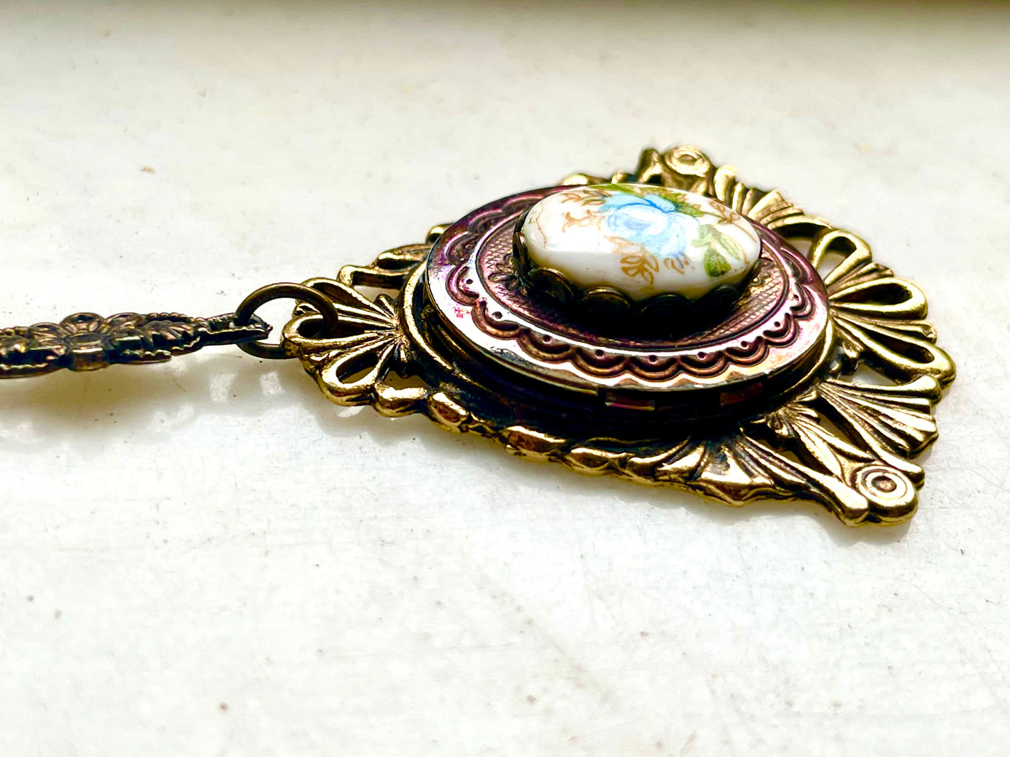 Art Nouveau Brass & Titanium Oxidized Rainbow Metal Porcelain Limogé Blue Rose Locket Necklace