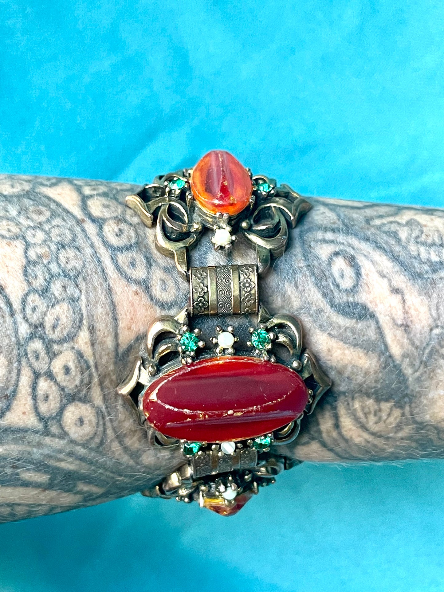 Heavy Brass Booklink Red-Orange Faux Amber Celluloid, Green Crystal & Pearl Panel Link Bracelet