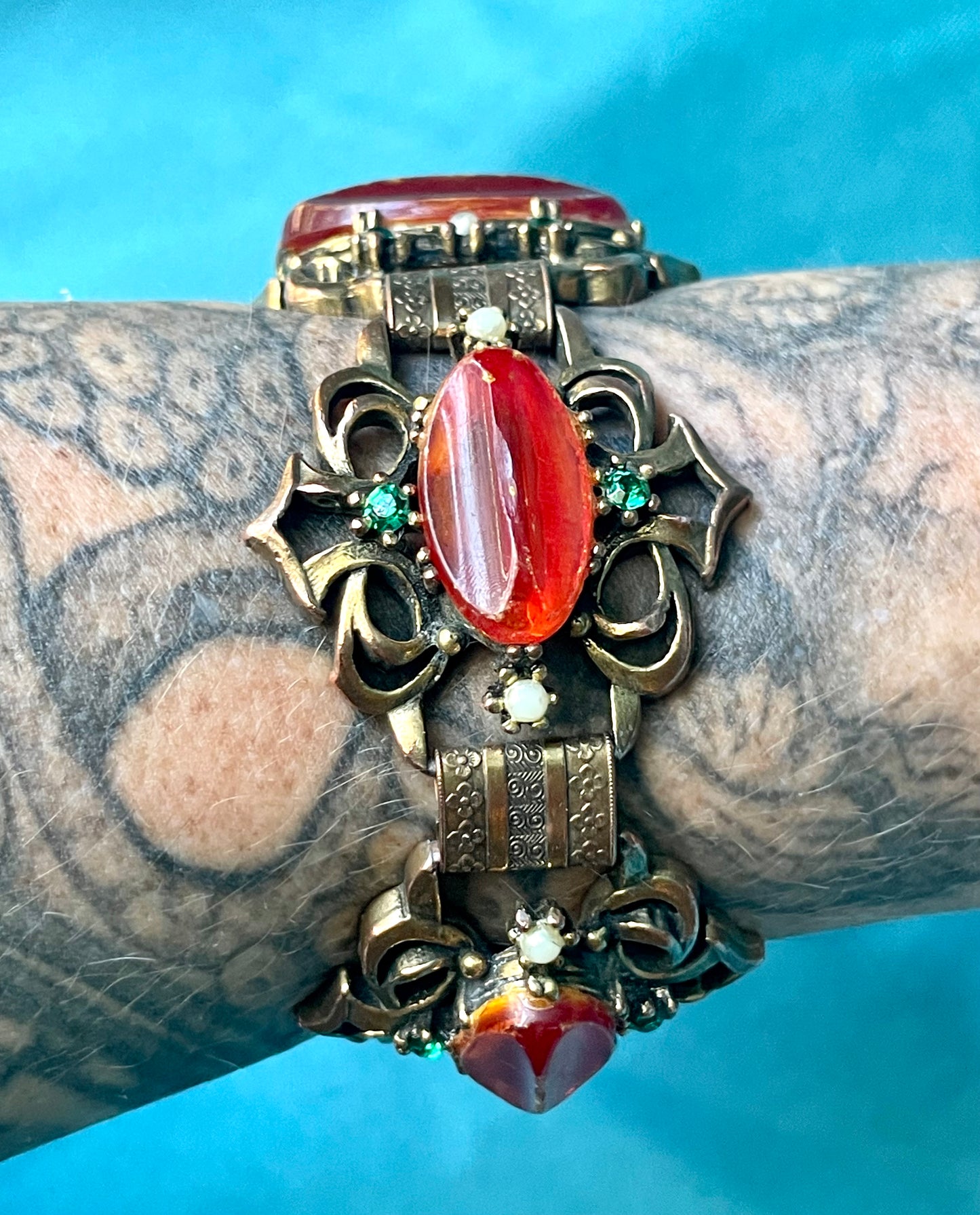 Heavy Brass Booklink Red-Orange Faux Amber Celluloid, Green Crystal & Pearl Panel Link Bracelet