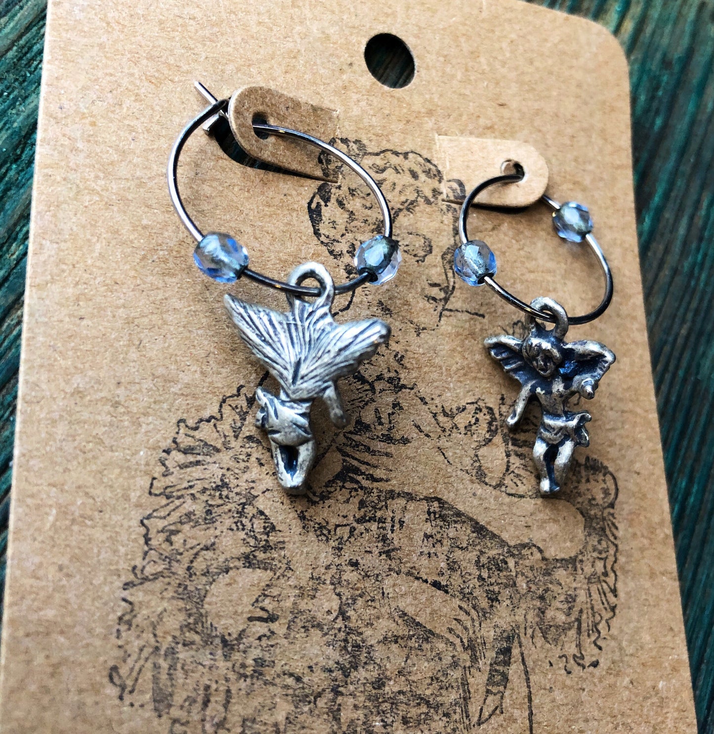Sterling silver & blue topaz cherub angel hoop earrings
