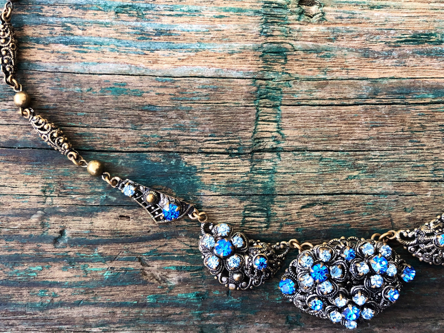West German Art Nouveau Edwardian Brass Filigree with Prong Set Blue Crystal Bob necklace