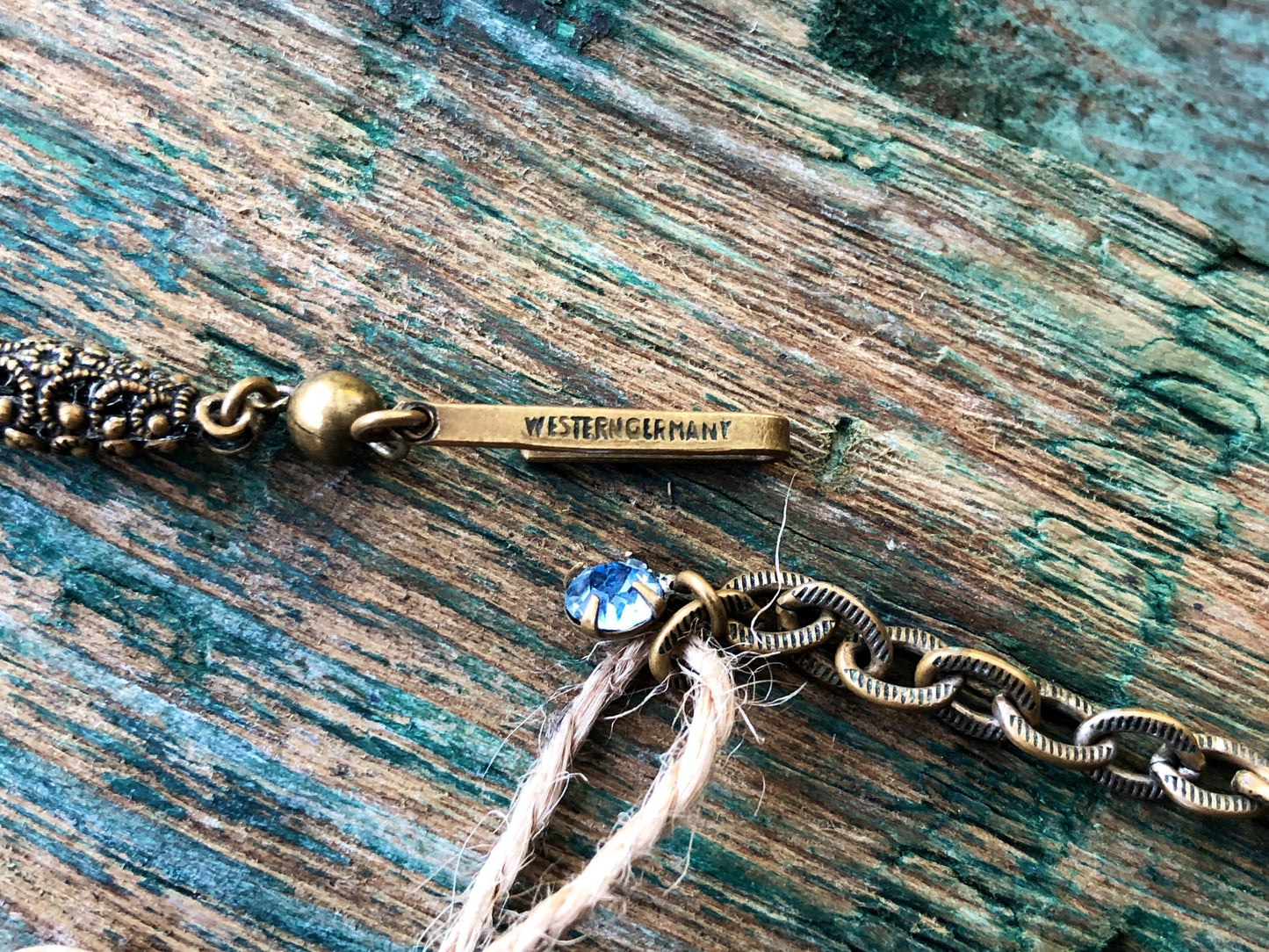 West German Art Nouveau Edwardian Brass Filigree with Prong Set Blue Crystal Bob necklace