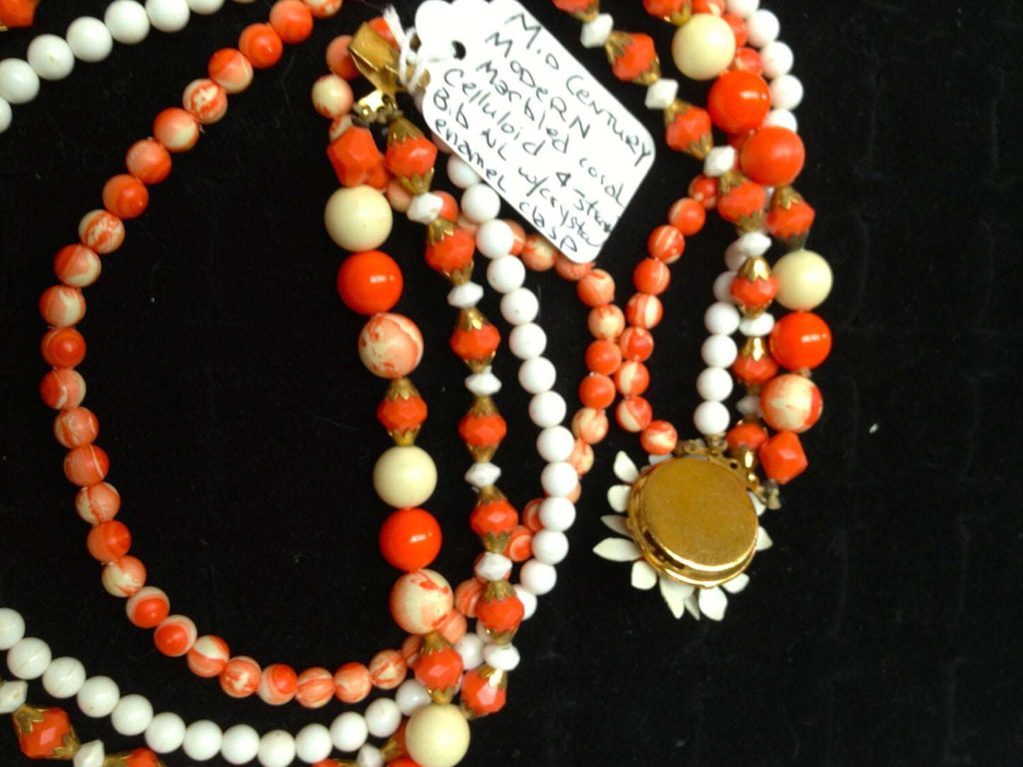 Vintage Orange & Cream Faceted and Marbled Early Plastic and Brass Beaded Multi Strand Bib Necklace with Enamel Crystal Flower Clasp