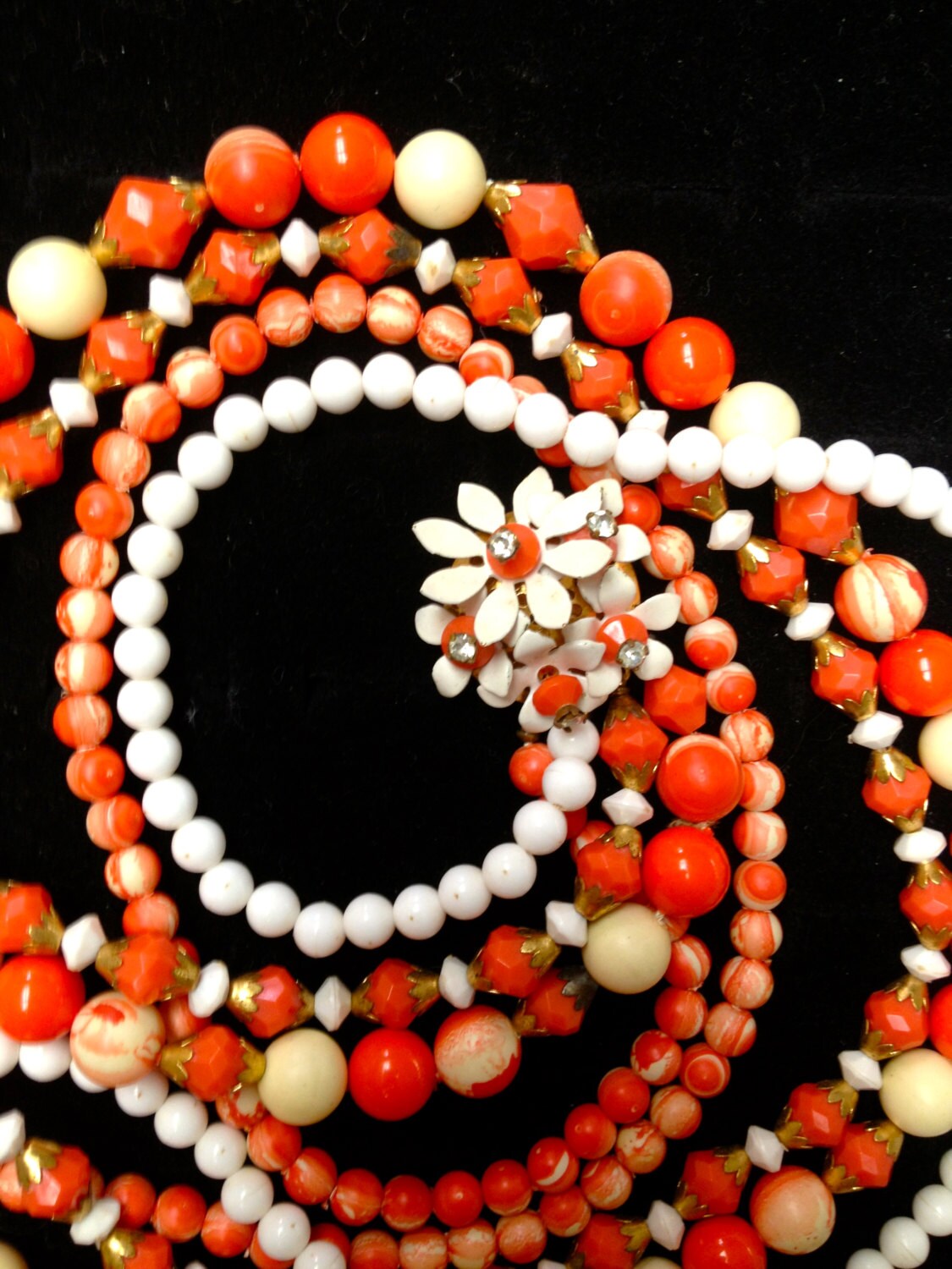 Vintage Orange & Cream Faceted and Marbled Early Plastic and Brass Beaded Multi Strand Bib Necklace with Enamel Crystal Flower Clasp